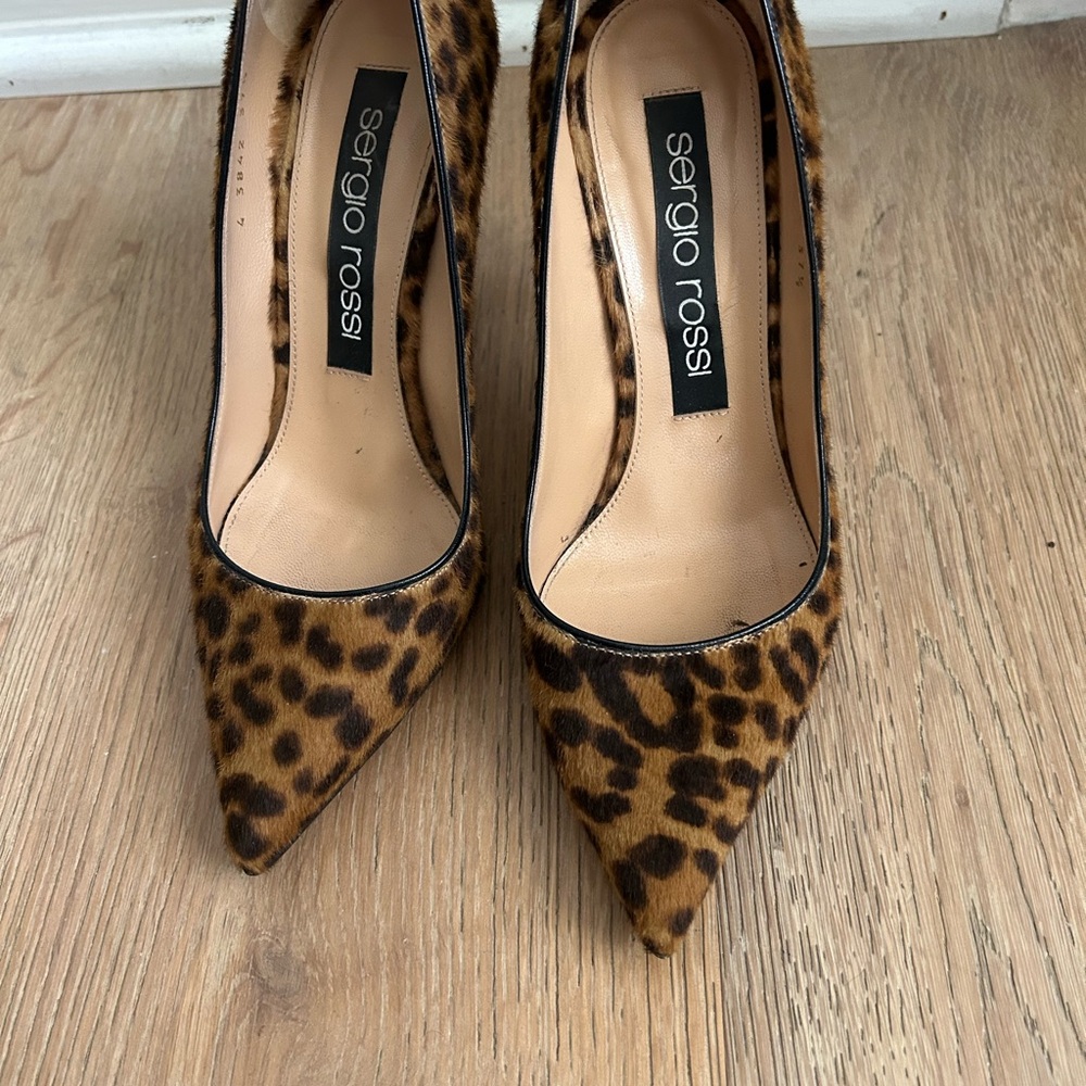 Sergio Rossi leopard print pony hair pointed toe heels with 4 inch heels.